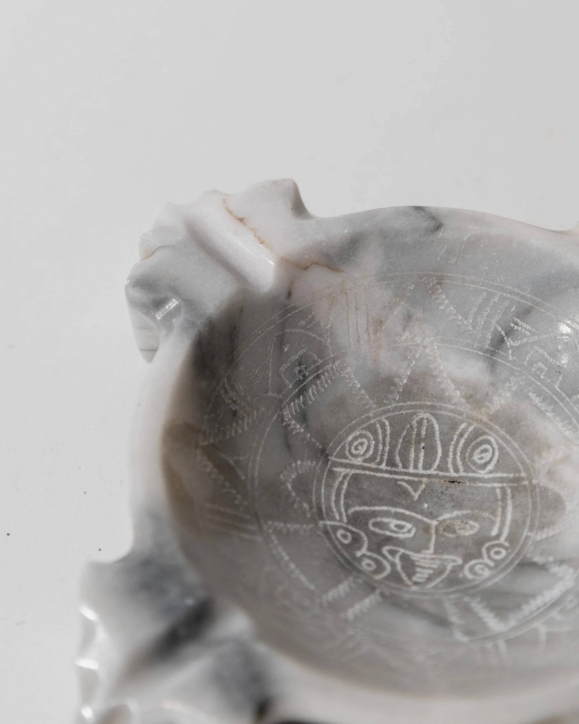 Vintage Mexican marble ashtray from the 1970s, engraved Aztec pattern.