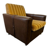 Fauteuil vintage brun / oker / un siège sur roulettes