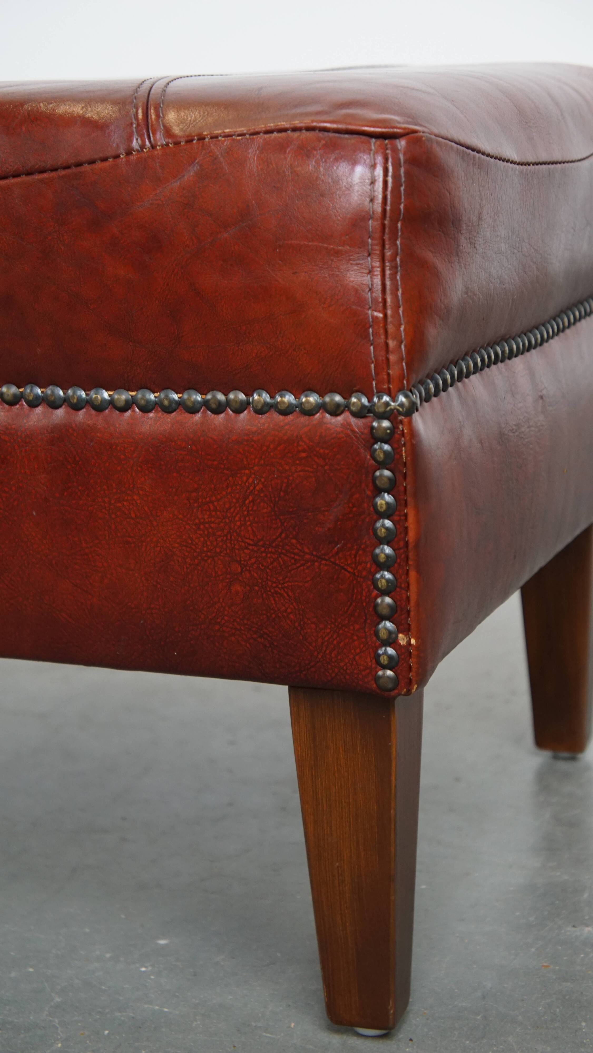 Ottoman couleur cognac en cuir de vachette