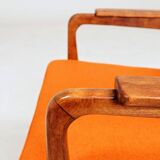 Vintage armchair in papaya orange wool from the 1960s.