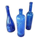 3 blue bottles