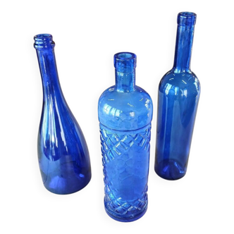 3 blue bottles