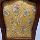 Louis XV style cabriolet armchair in solid wood, yellow floral fabric.