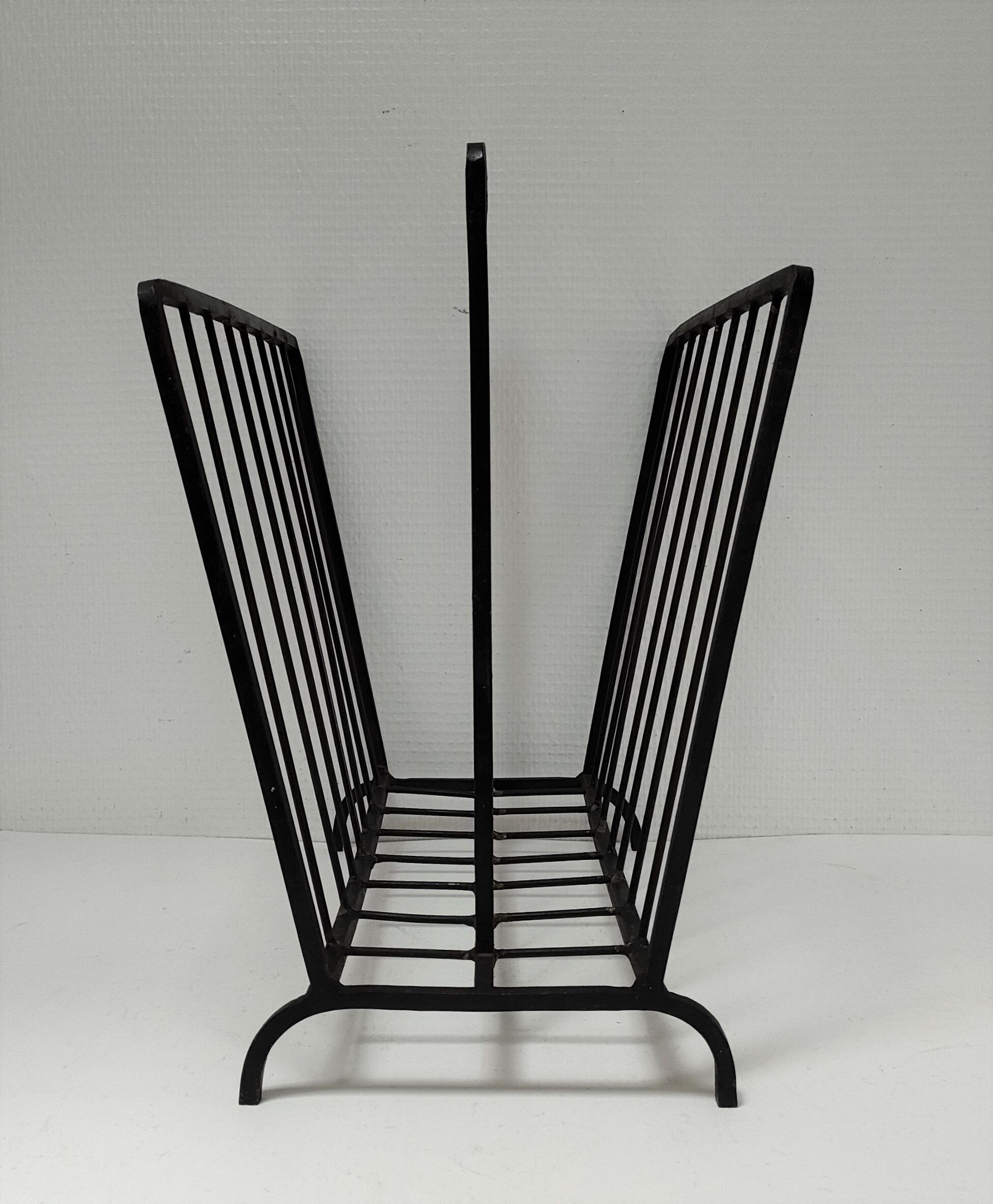 Modernist magazine holder black iron 60s