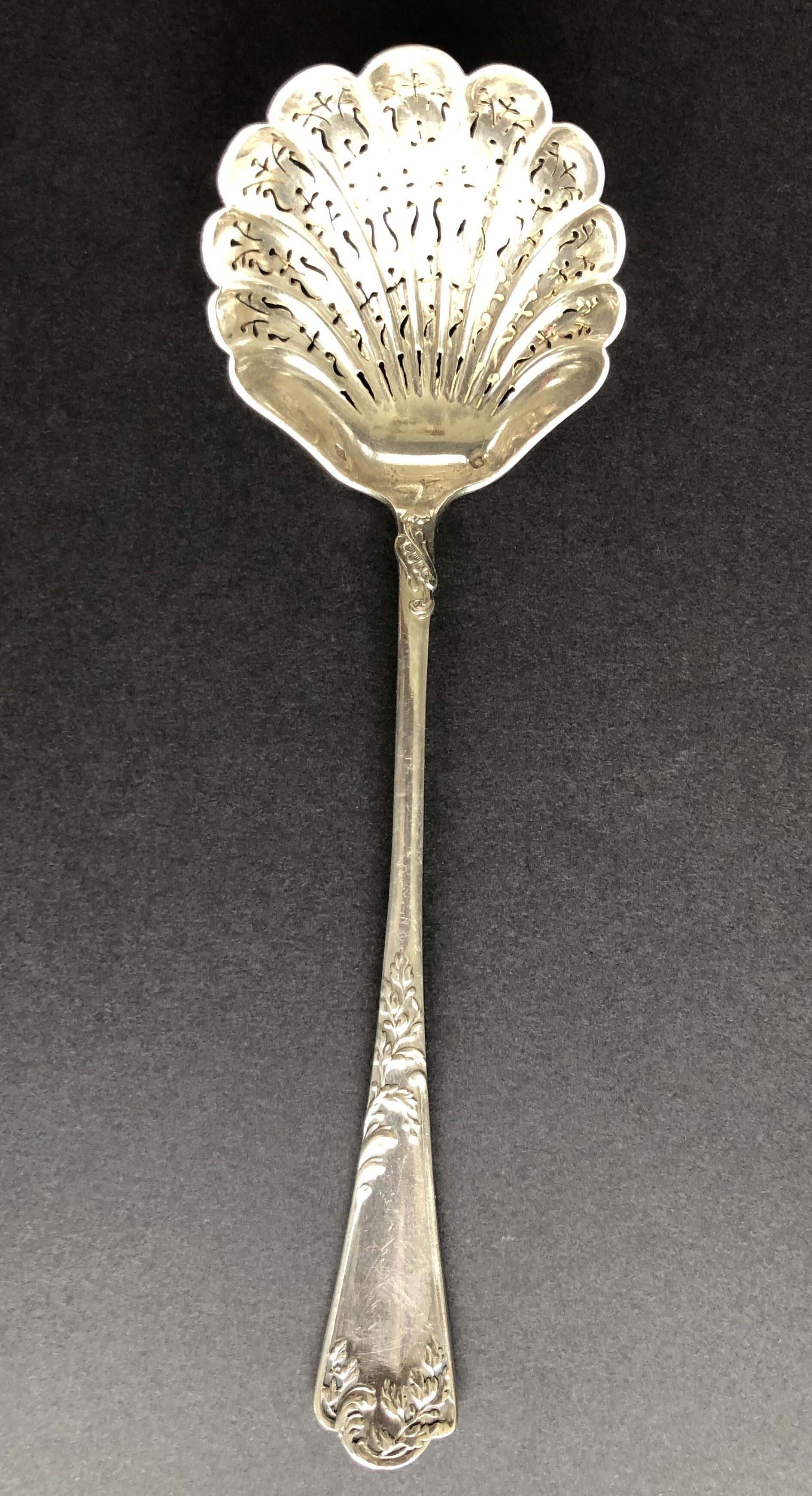 Silver sprinkling spoon