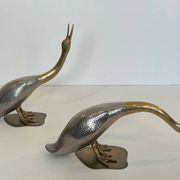 Suite de 2 canards en métal argenté et laiton