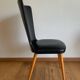 Black chair with compass legs
