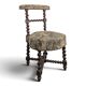 Napoleon III smoking chair in twisted blackened wood with foliage upholstery.