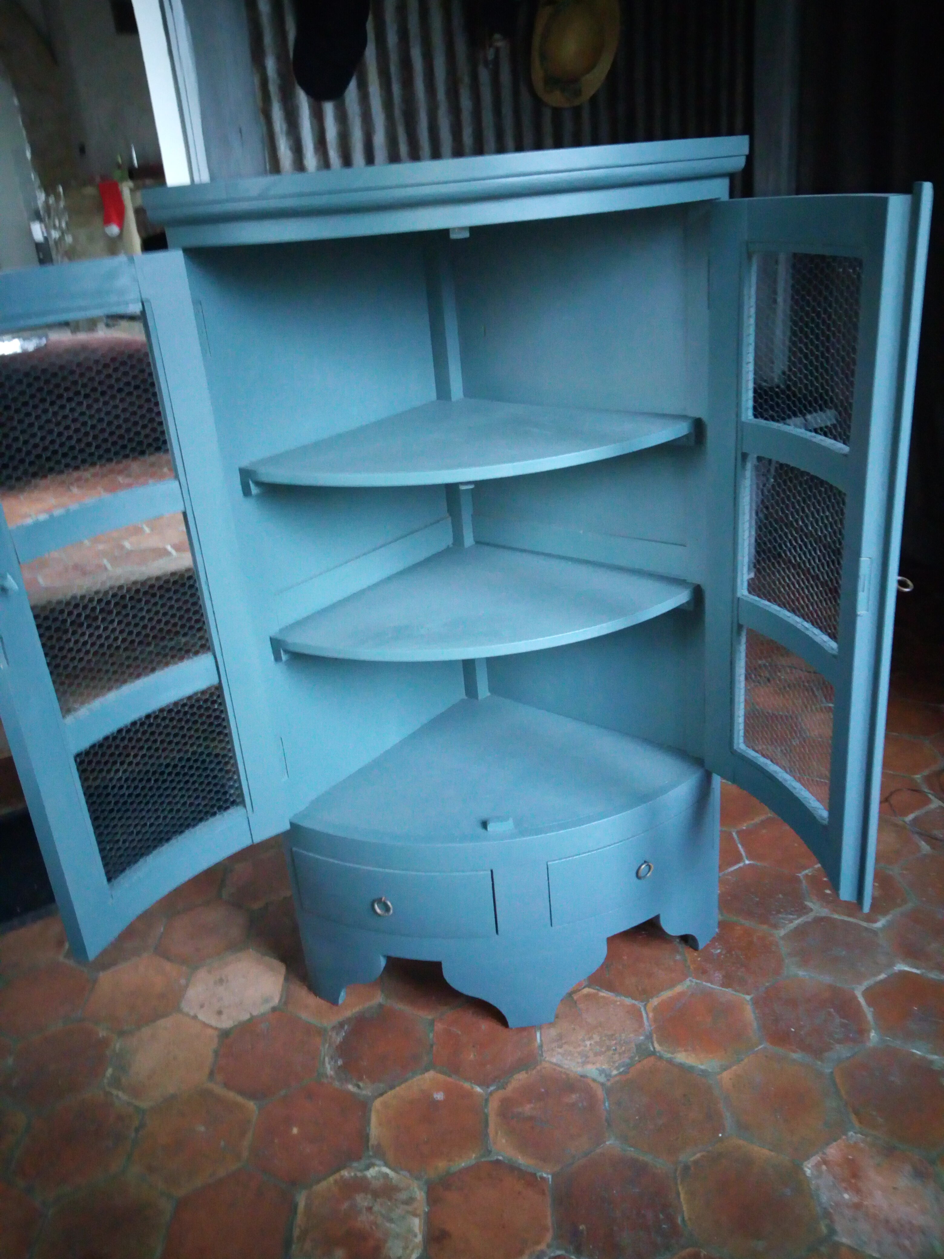 Storage in corner cabinet