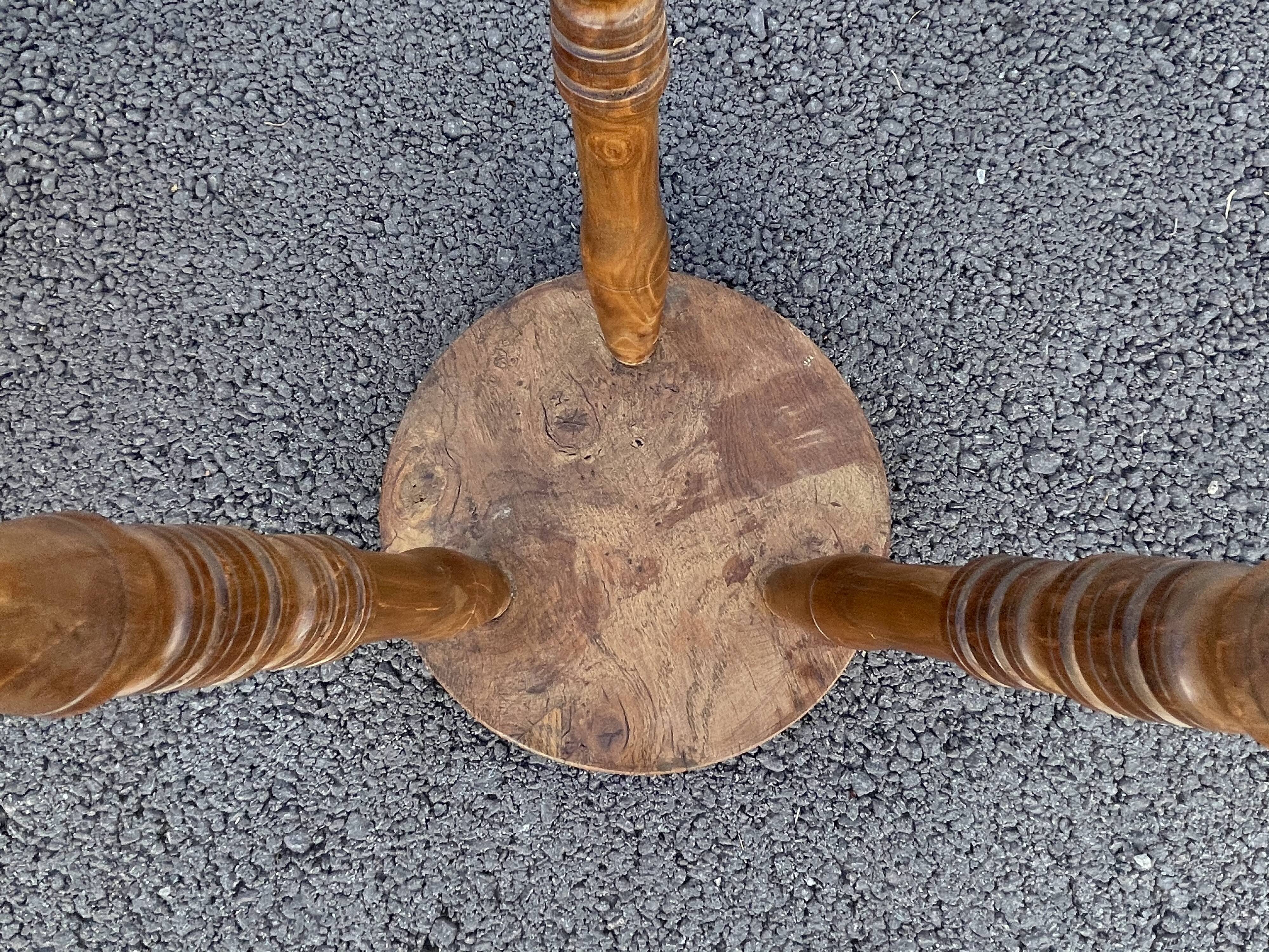 Wooden tripod stool