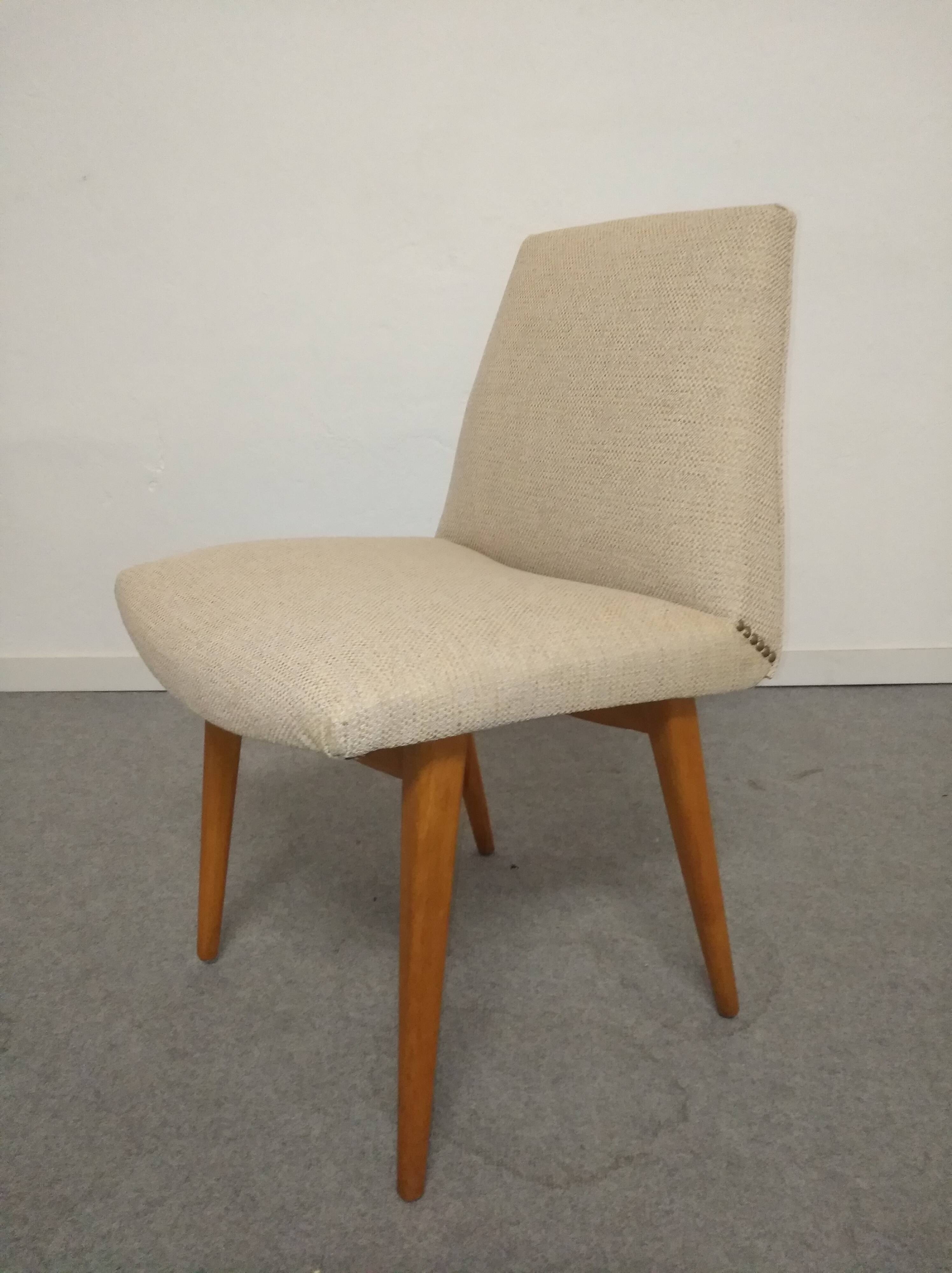 Pair of cocktail chairs in beech, Eastern Europe circa 1960.