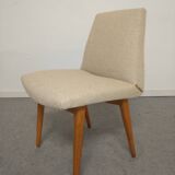 Pair of cocktail chairs in beech, Eastern Europe circa 1960.