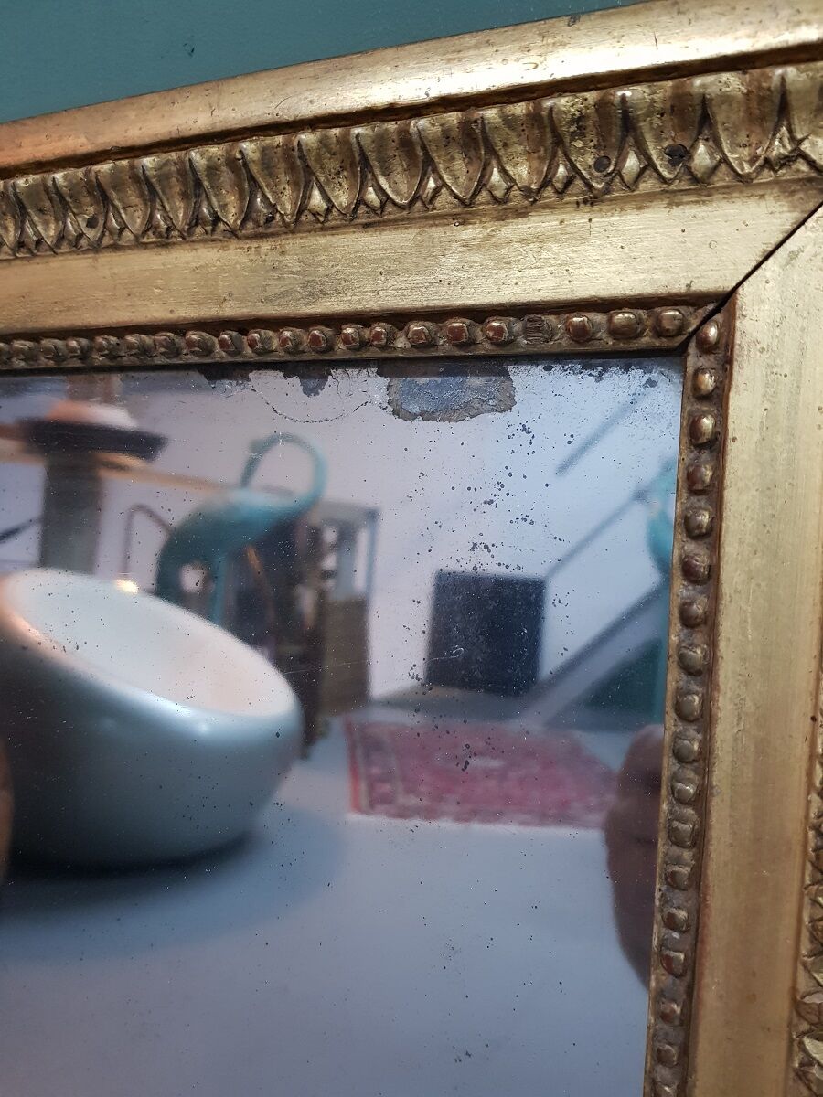 Antique french gilded Louis XVl mirror with mercury glass