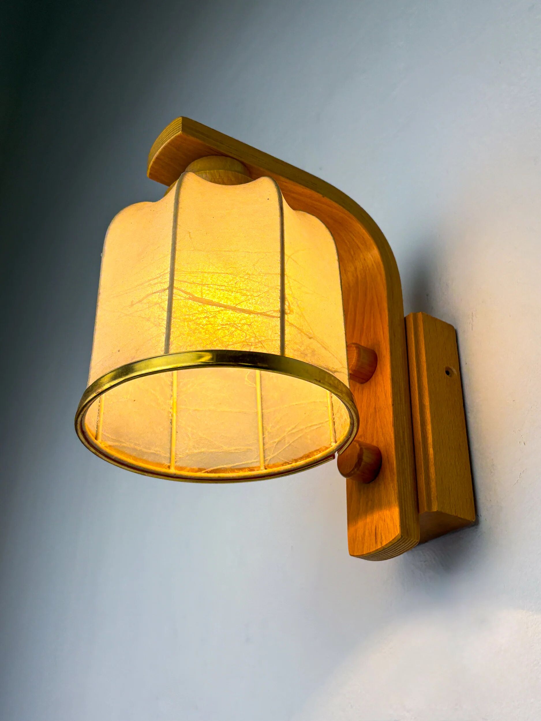 Cocoon wall lamp, resin and pine, Italy, Circa 1970's