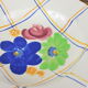Lot de 12 assiettes motif fleurs de champagne.