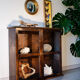 Black patinated wood showcase to be placed or hung