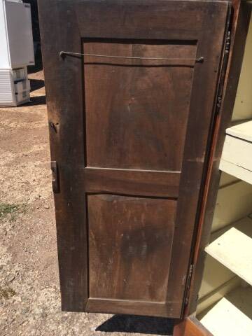 Old rustic farmhouse cabinet in fruit wood