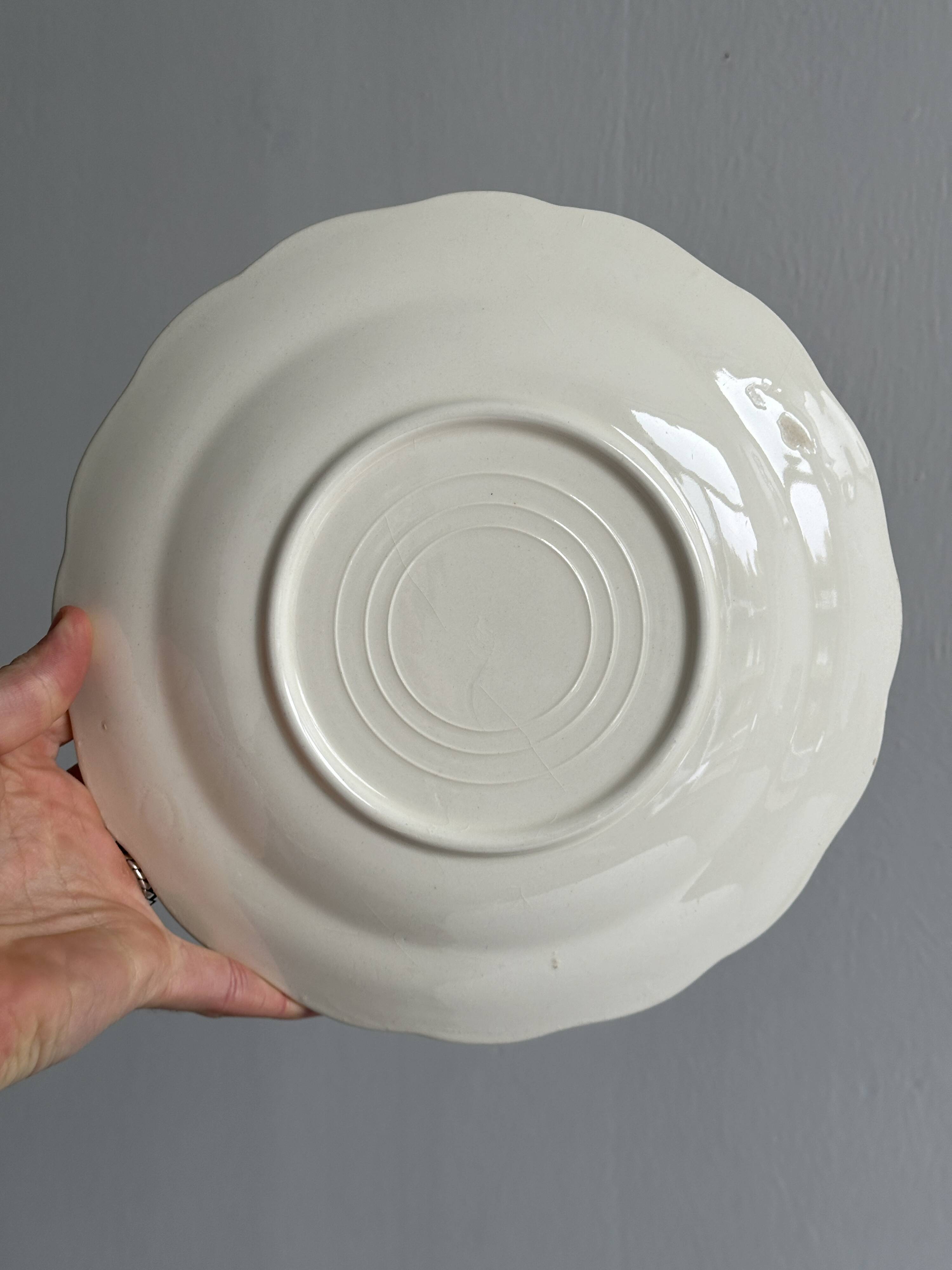 Vintage blue polka dot plate with scalloped edge