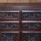 Paire de commodes vintage en bois dur sculpté