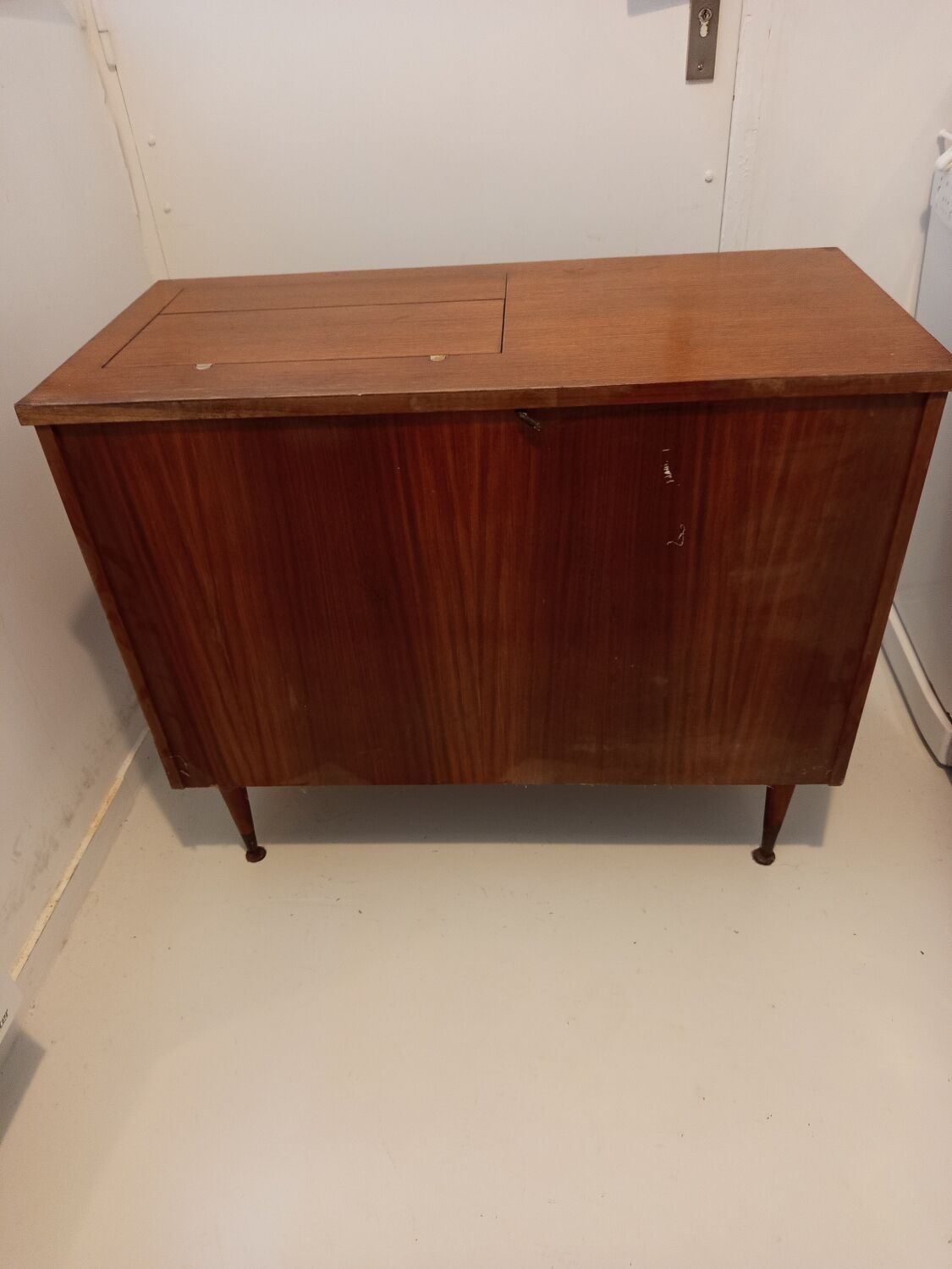 Antique sewing machine cabinet