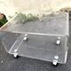 Plexiglas coffee table on wheels year 70