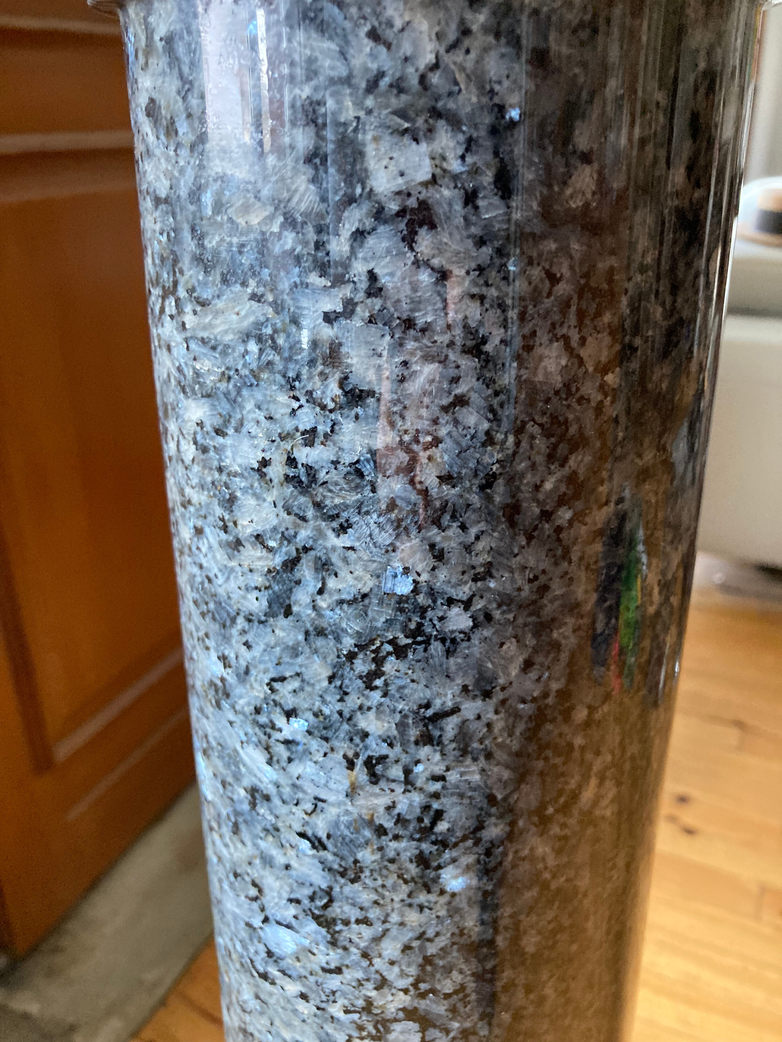 Granite column with pearly reflections