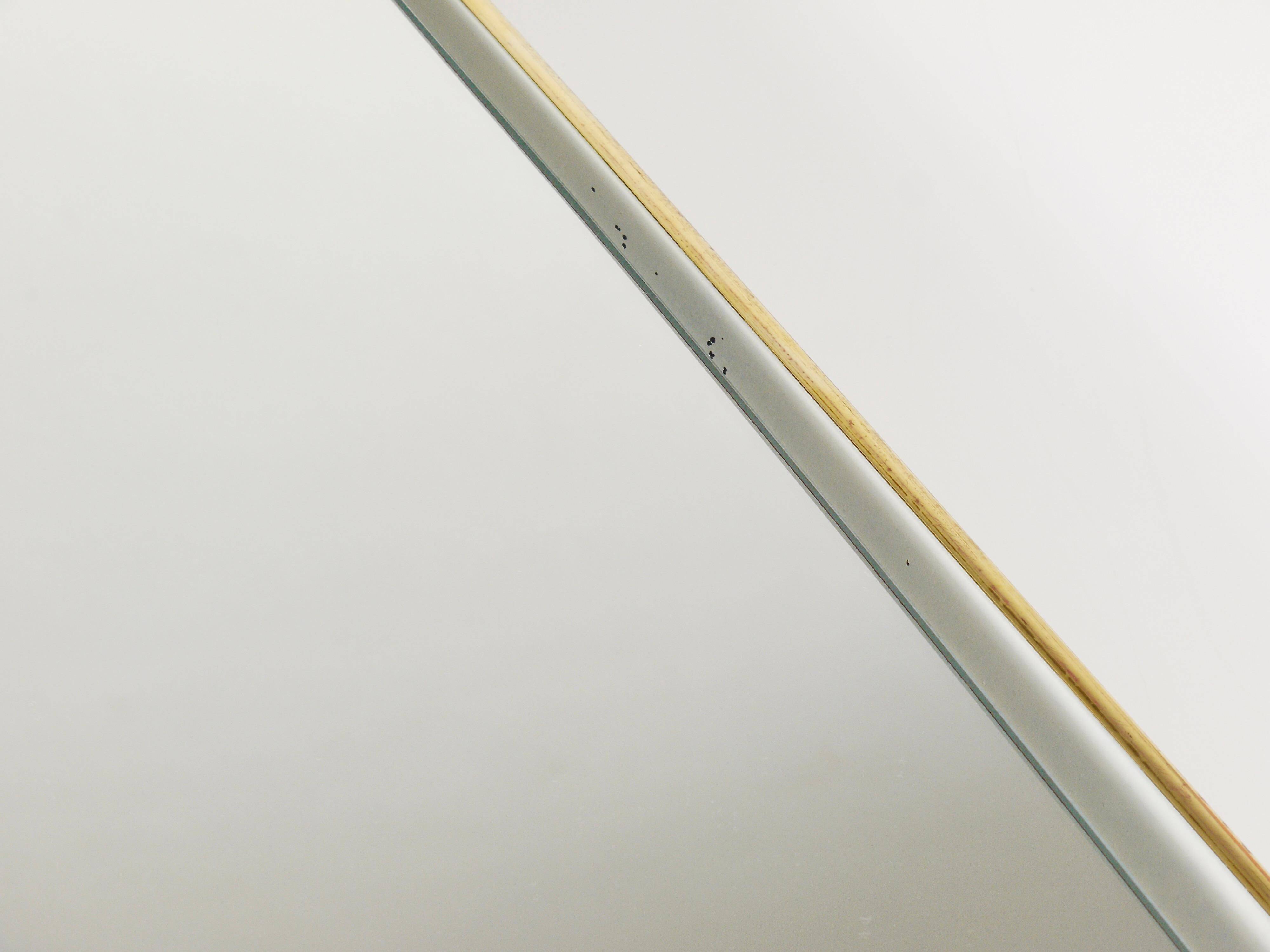 Mid-century illuminated wall mirror by Ernest Igl with brass crown, by Hillebrand.