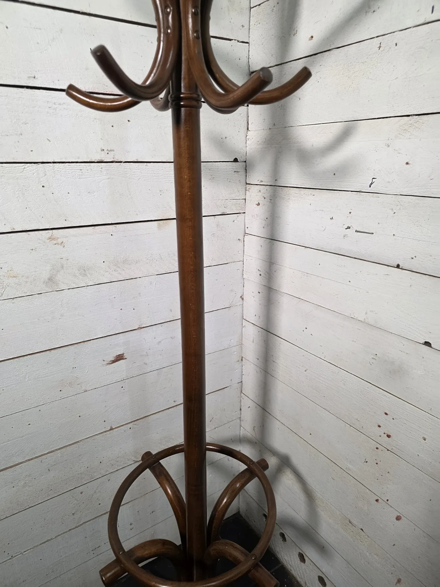 Curved antique wooden parrot