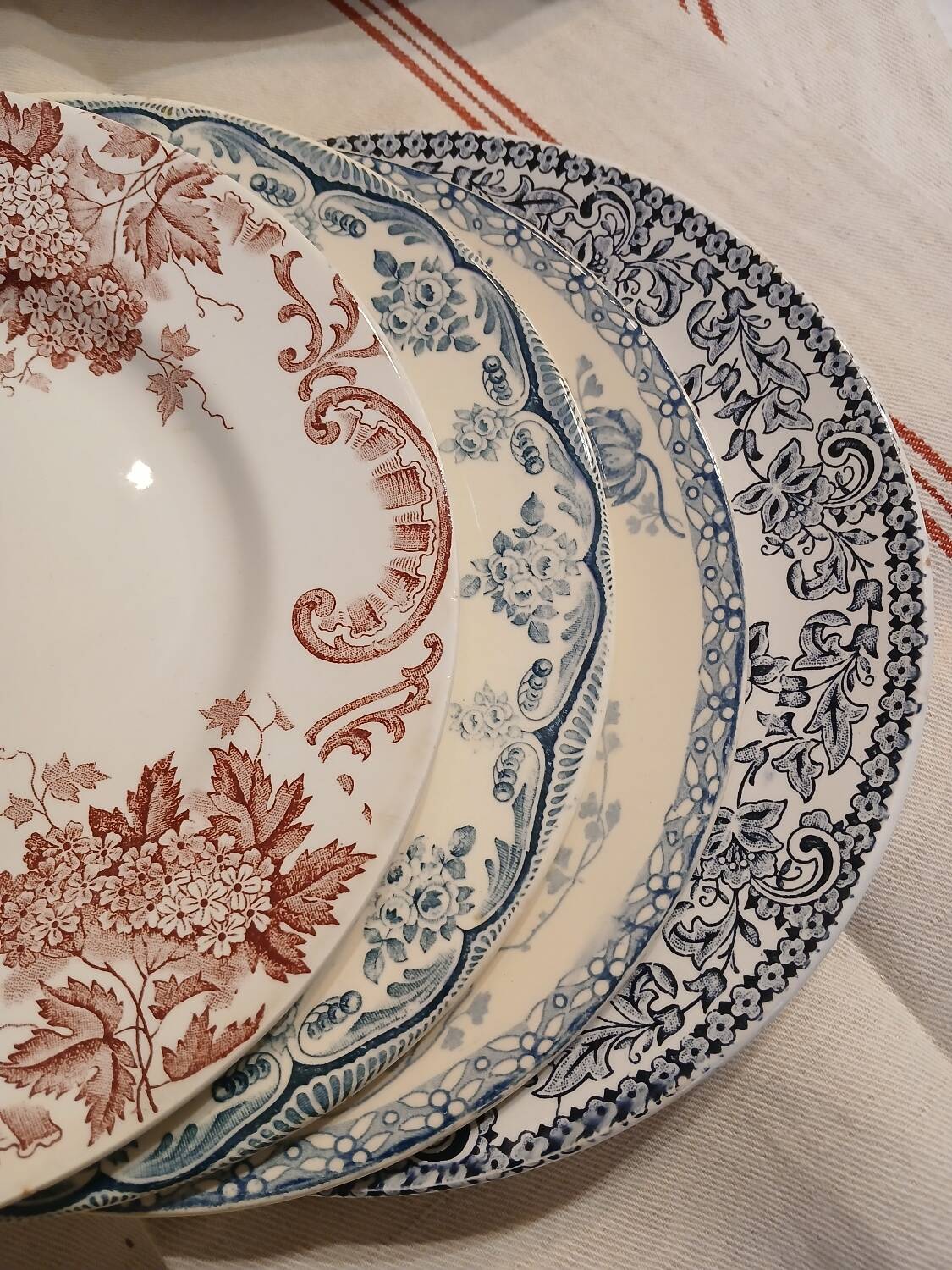 8 mismatched ironstone dinner plates