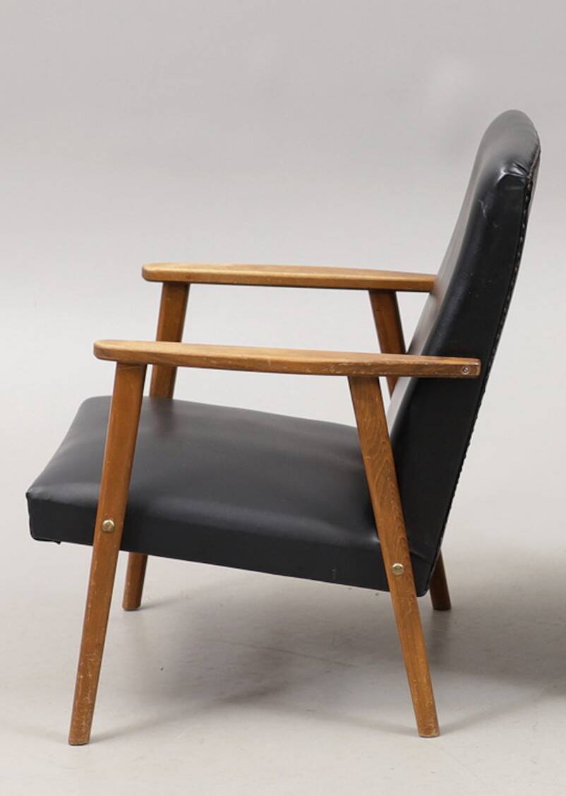 Vintage imitation leather armchair made in Germany