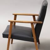 Vintage imitation leather armchair made in Germany