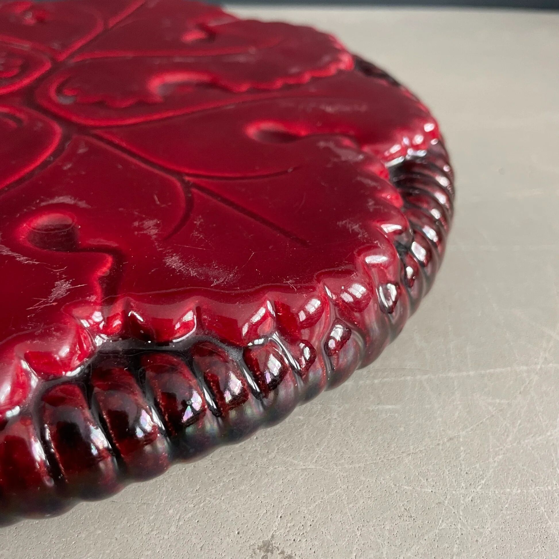 Burgundy ceramic trivet
