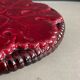 Burgundy ceramic trivet