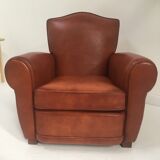 Large club chair in cognac leather