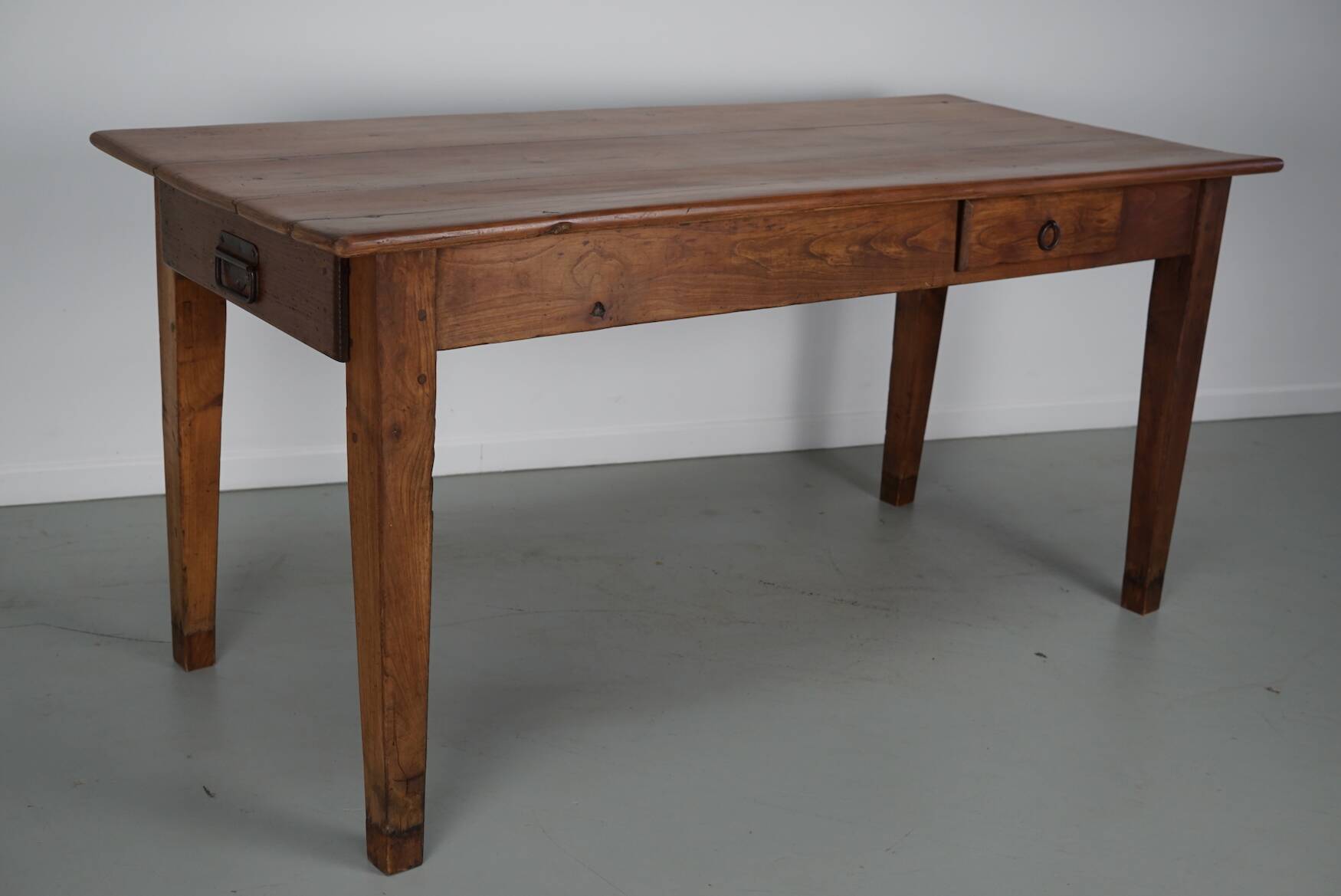 Rustic dining table in fruitwood from the early 20th century