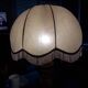 Turned wood table lamp with “skin” shade