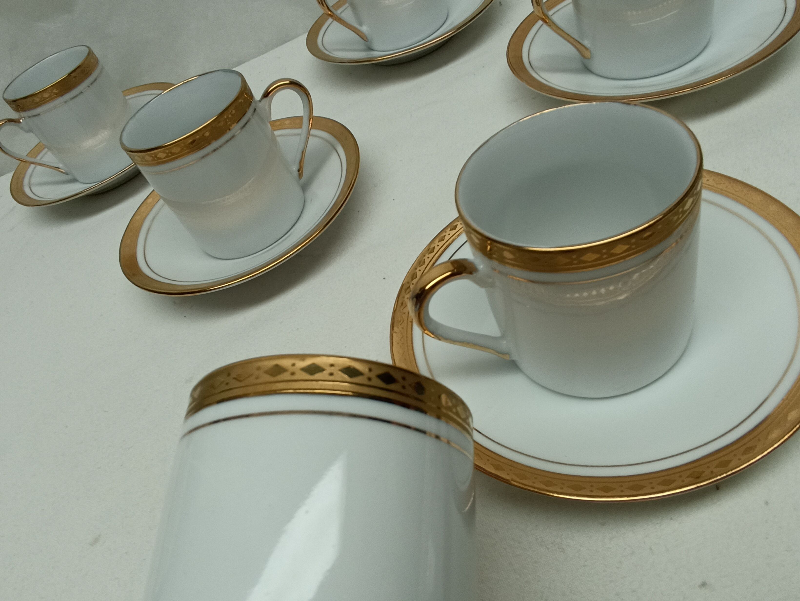 12 cups, porcelain coffee service with 24 carat gold gilding