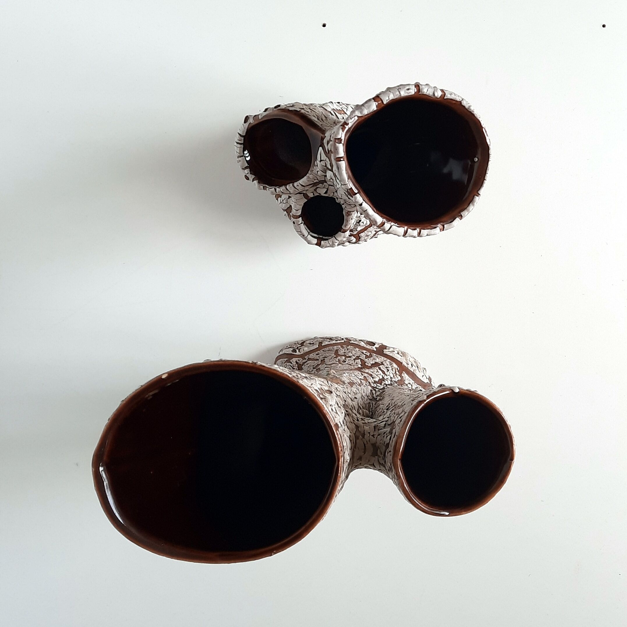 2 Vases of Vallauris in ceramic swaddled volcanic effect.