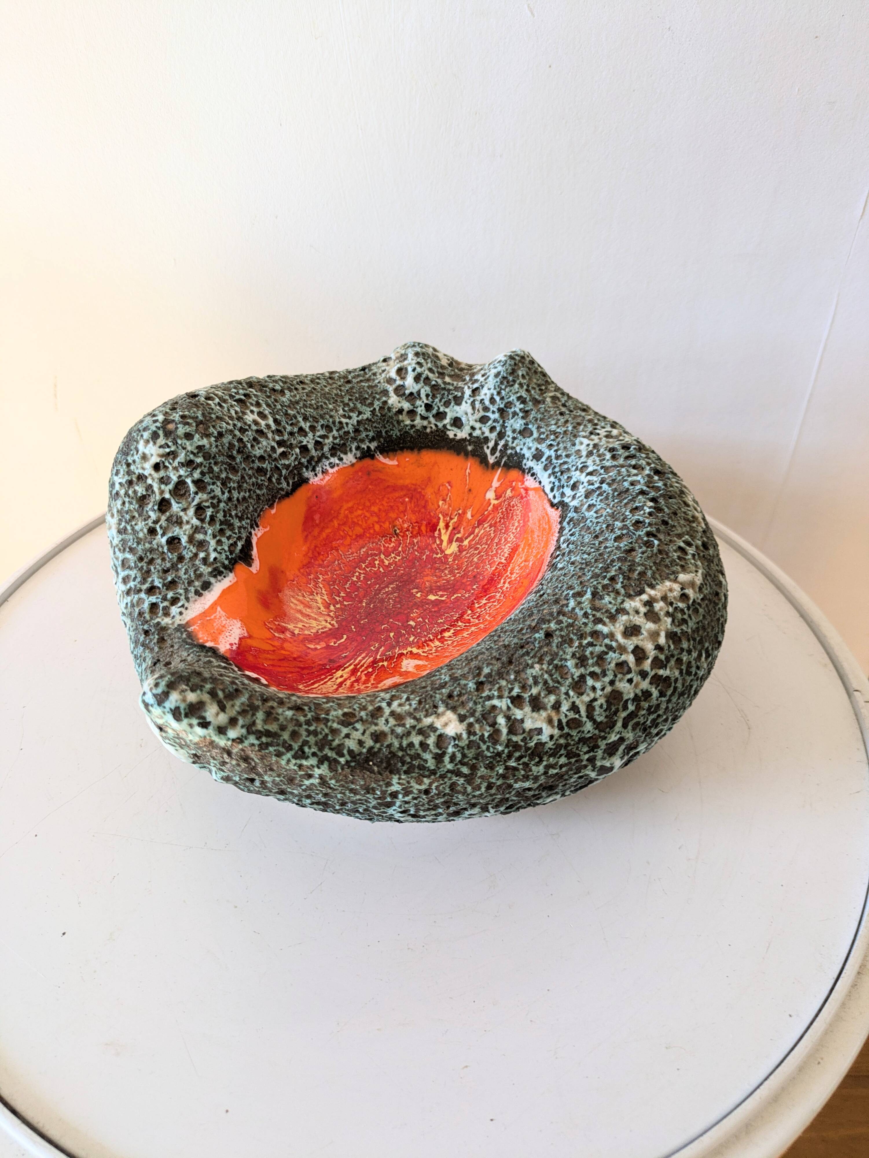 Volcanic lava pocket emptier, 70s design