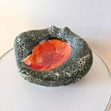 Volcanic lava pocket emptier, 70s design