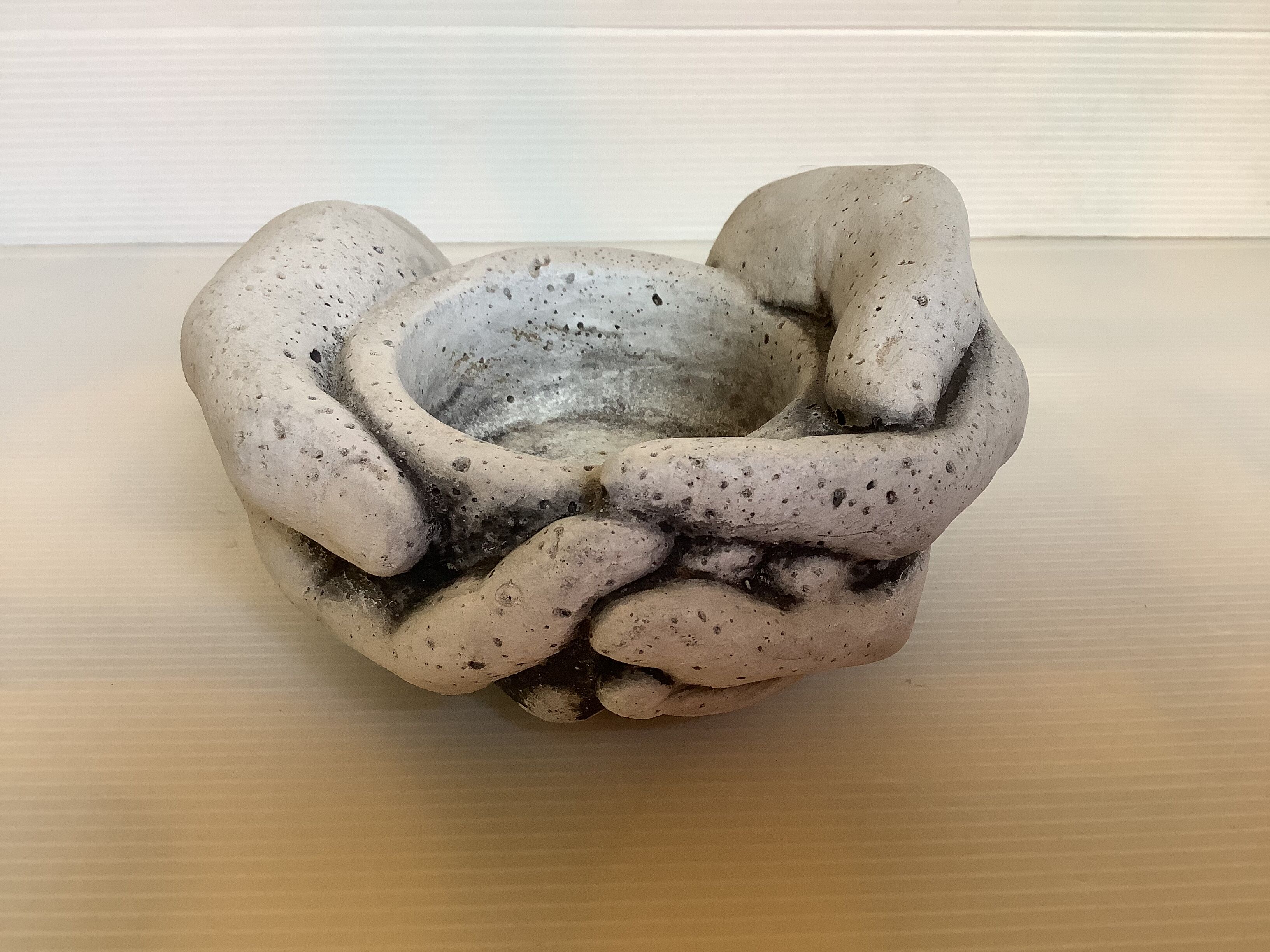 Hand candle holder gray black stone