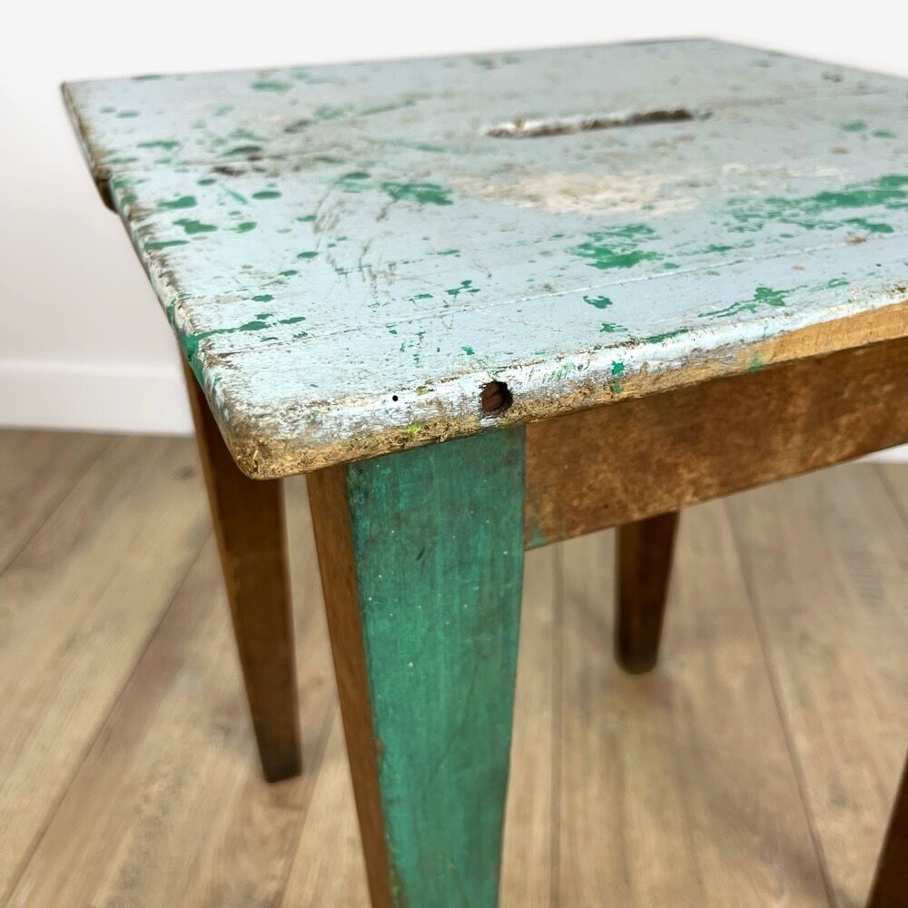 Old wooden slot stool