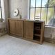 Large row of solid oak loom sliding doors