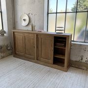 Large row of solid oak loom sliding doors