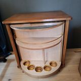 Vintage retractable swivel bar cabinet from the 1950s