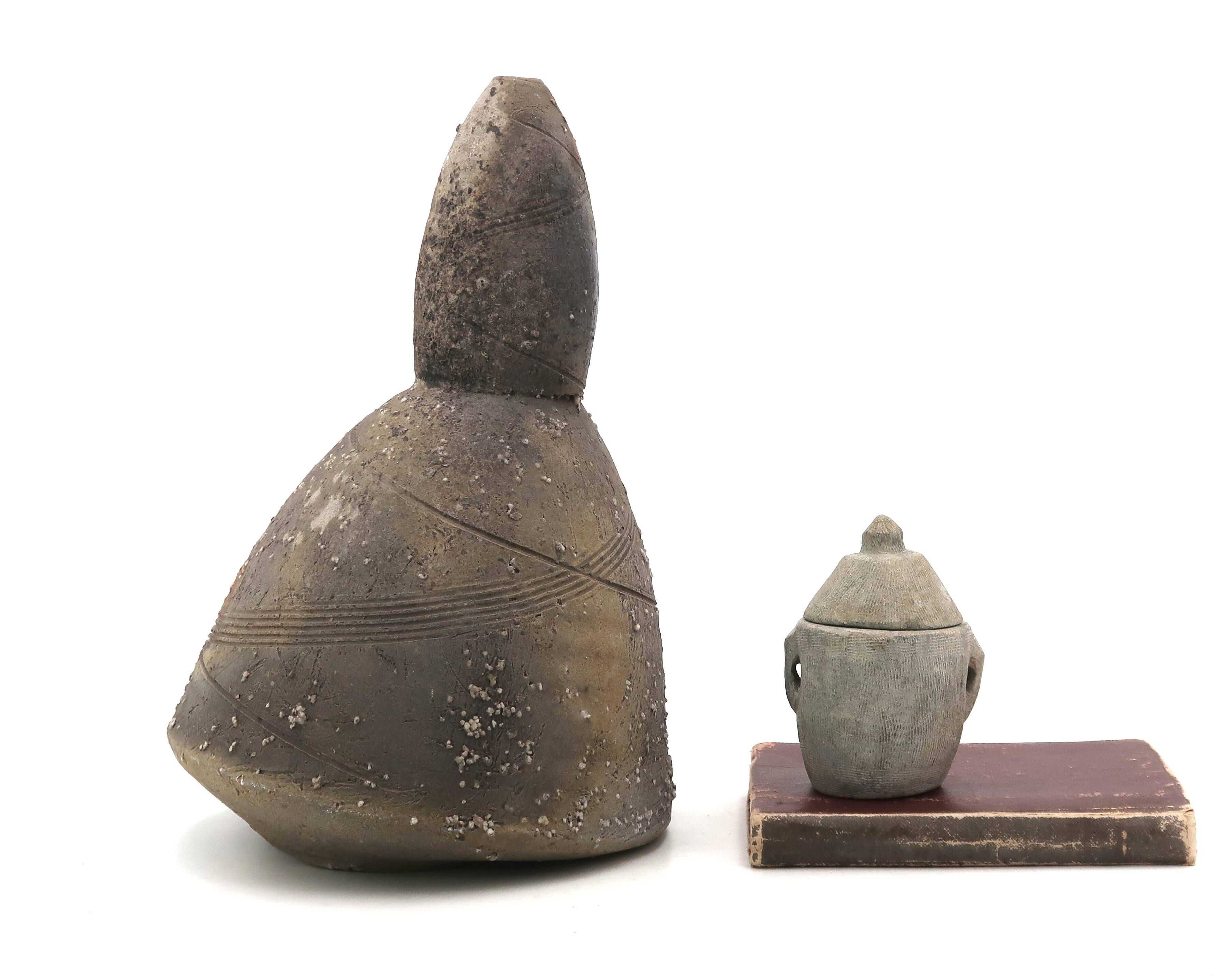 Sandstone sculpture by Eric Astoul, ceramic wood-fired kiln.