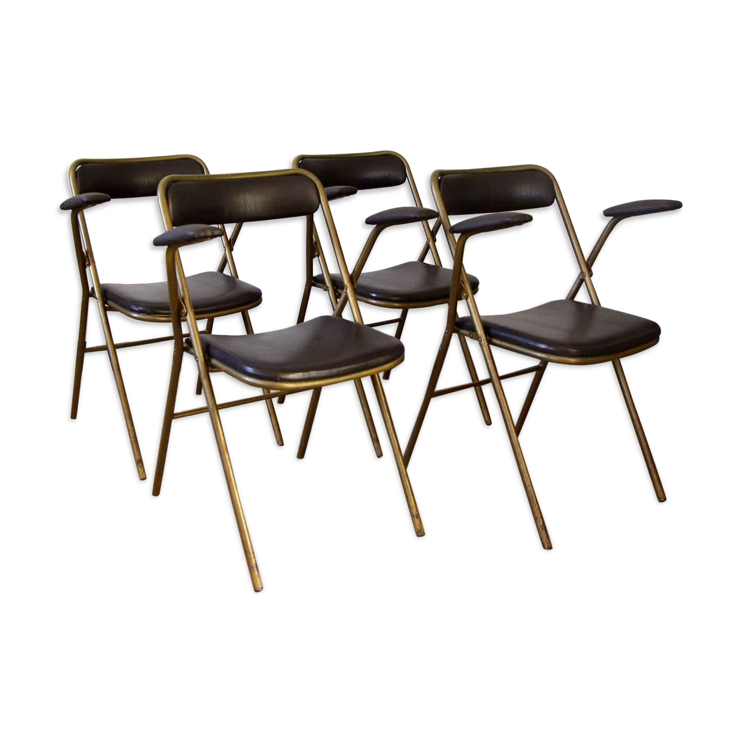 Lot of 4 metal and skai folding chairs