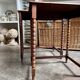 2 nesting tables in turned oak ☐ 62.5 x 33.5 cm