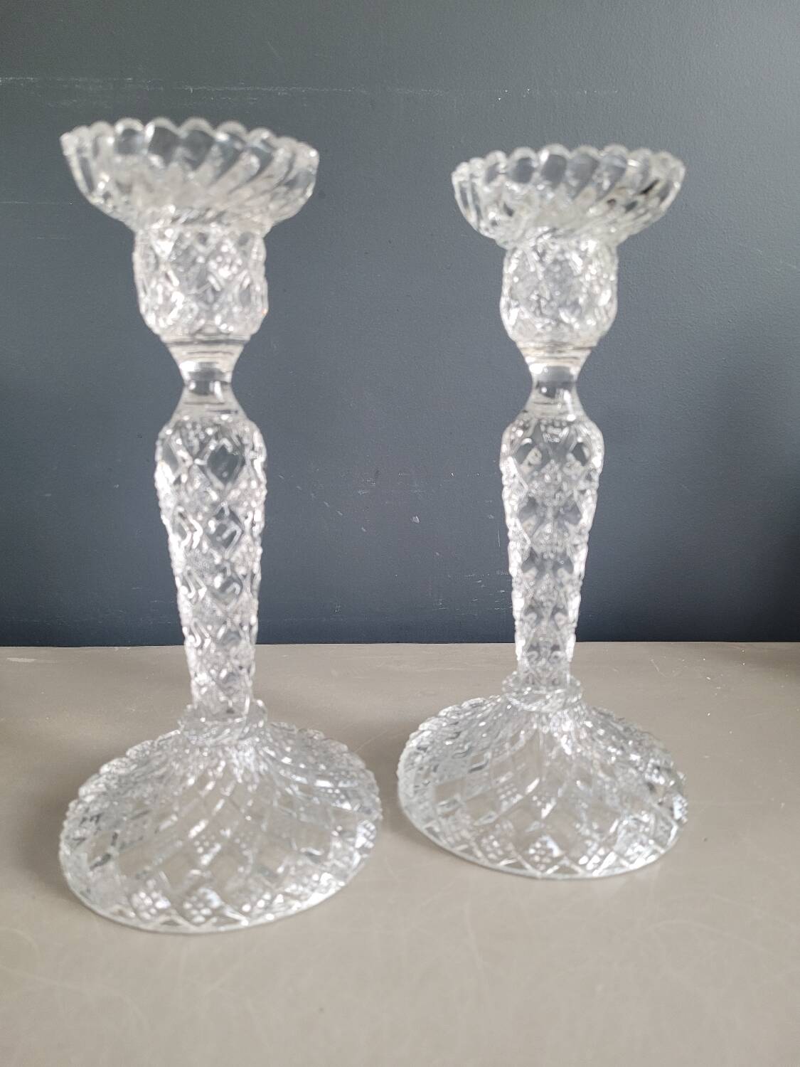 Pair of antique molded glass candlesticks