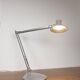 Grey LED architect lamp with spring arm and swivel base.